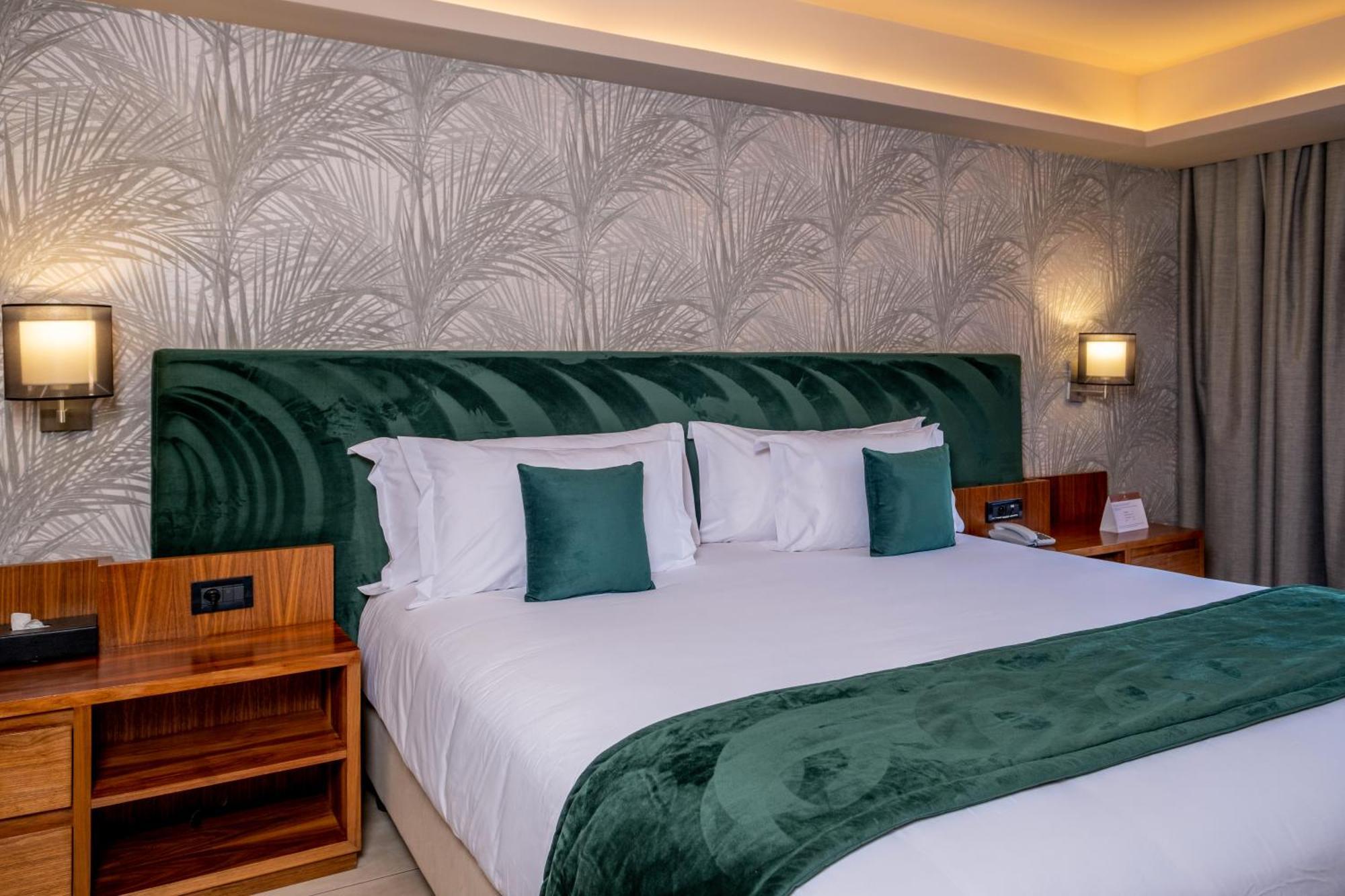 Hotel Kenzi Rose Garden Marrakesh Esterno foto A bedroom at the hotel
