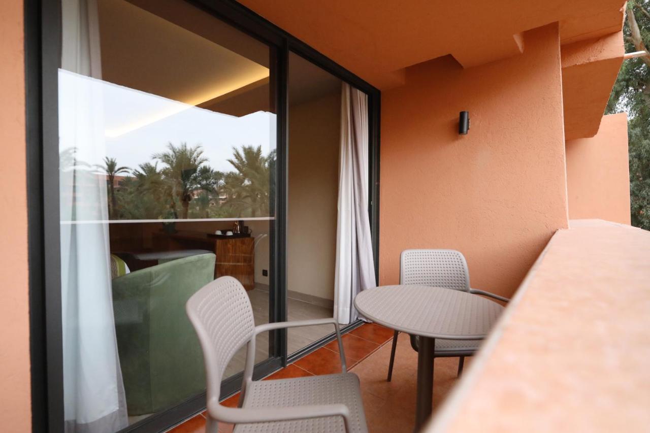Hotel Kenzi Rose Garden Marrakesh Esterno foto A balcony at the hotel
