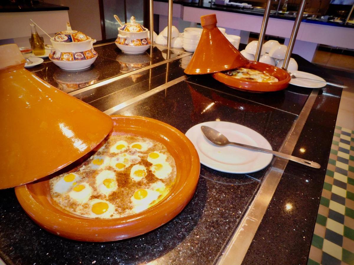 Hotel Kenzi Rose Garden Marrakesh Esterno foto Couscous with seafood