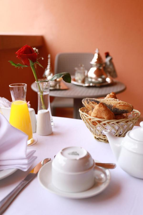 Hotel Kenzi Rose Garden Marrakesh Esterno foto A breakfast table
